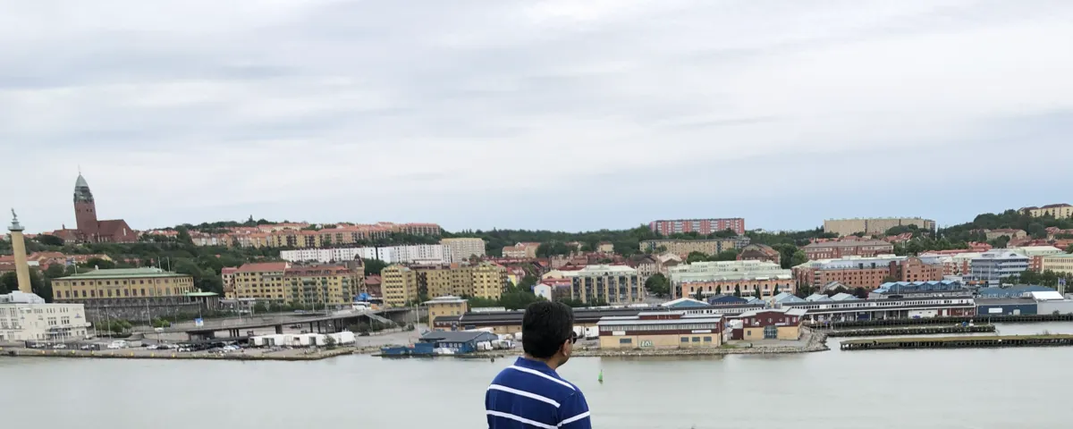 PKV, seen from behind, looking out across the river at the Göteborg harbour and skyline